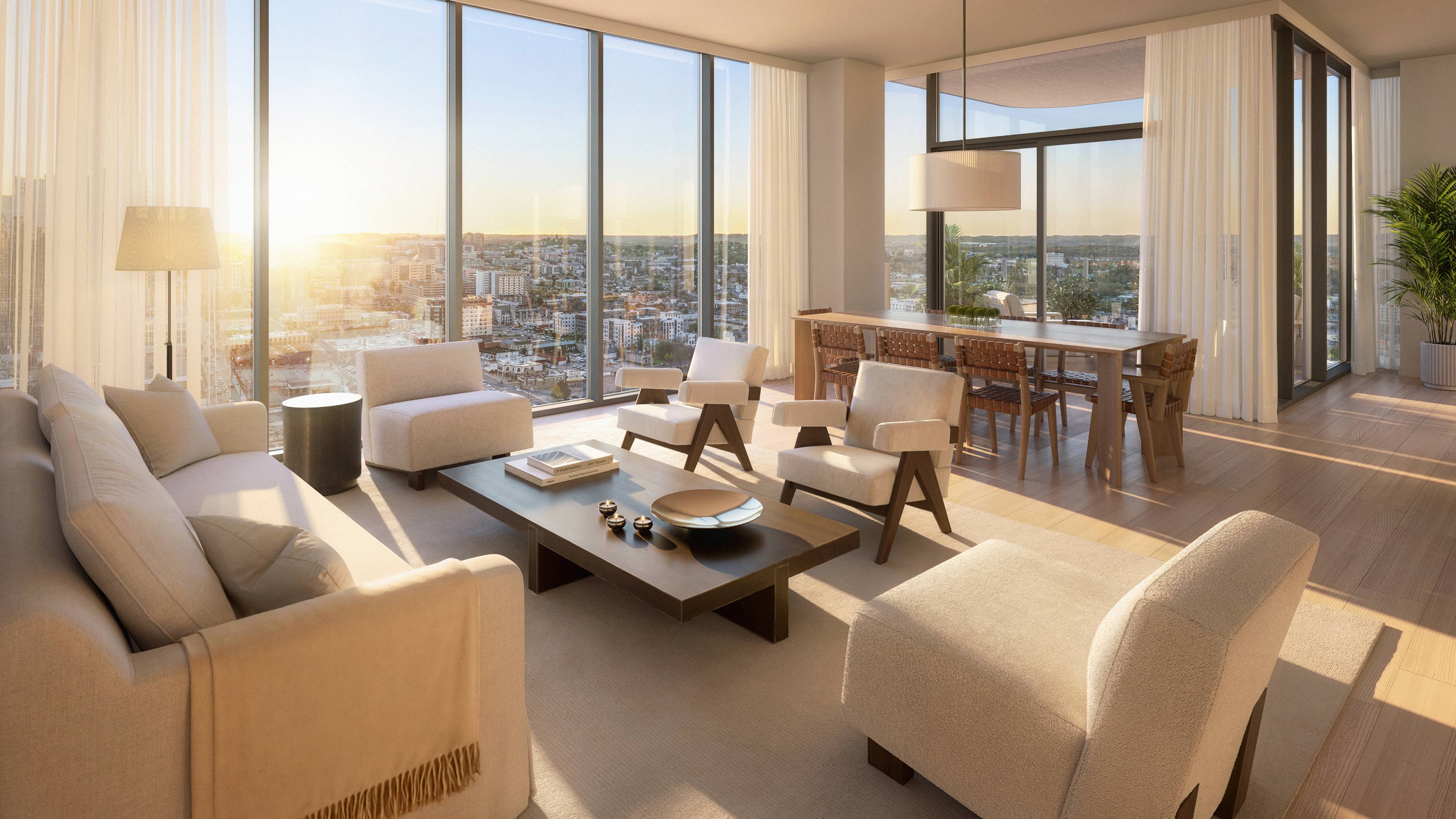 Living and dining spaces feature spectacular views through floor-to-ceiling windows.